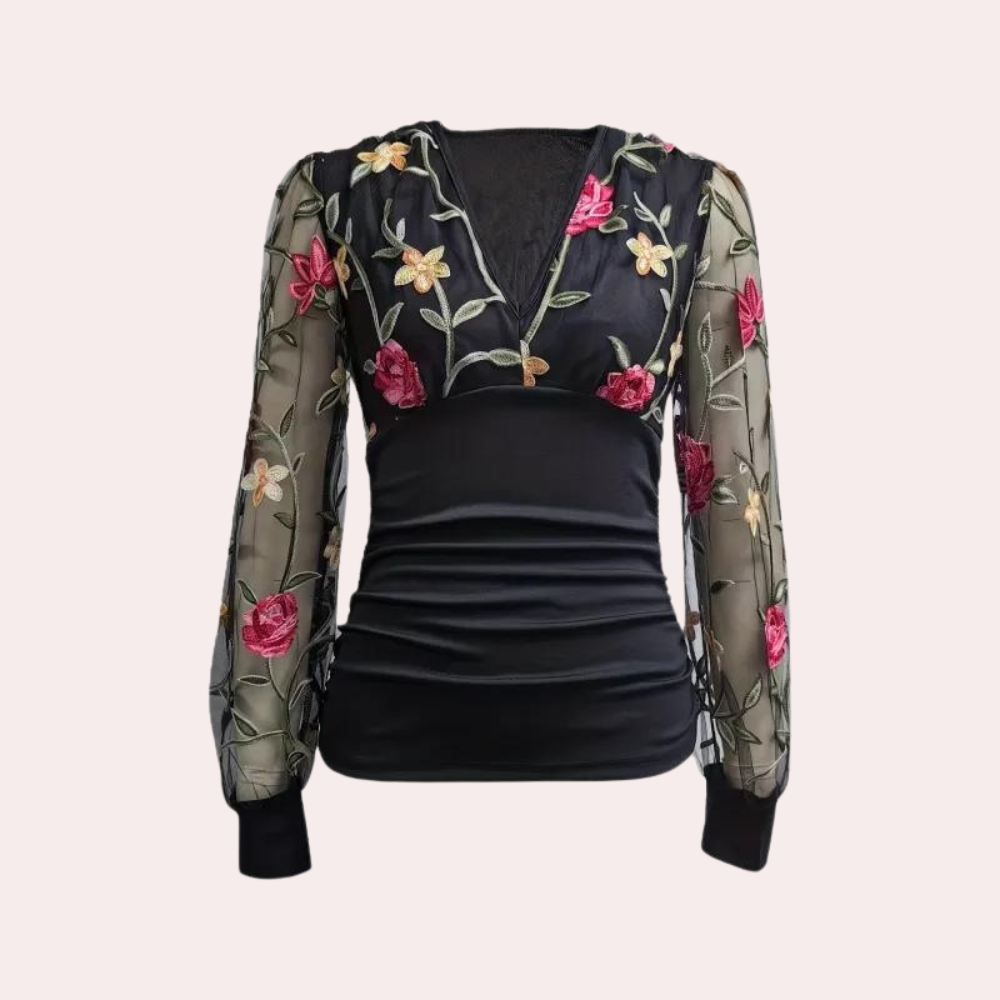 Elegante top de mujer con bordado floral