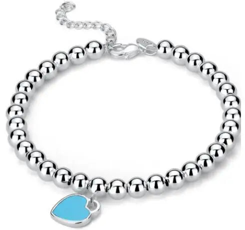 Pulsera de cuentas de plata con colgante de corazón | Con un sutil colgante de corazón