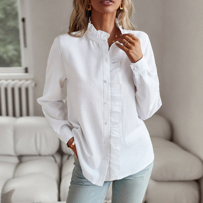 Elegante blusa de manga larga con volantes